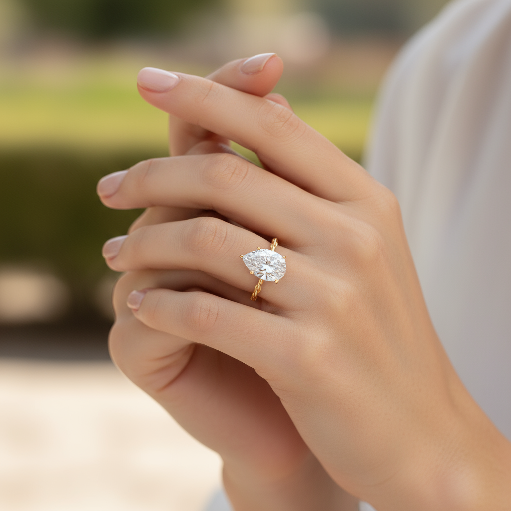 Pear Cut Diamond Twisted Band Ring – Timeless Romance in Every Braid